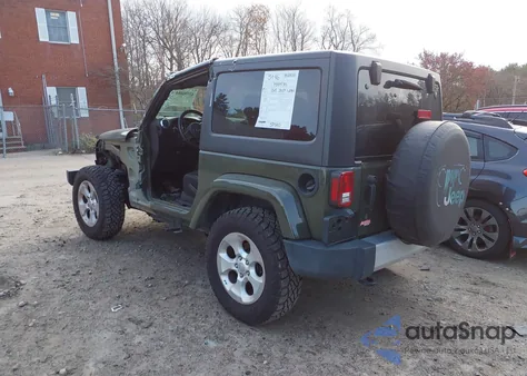 2015 Jeep Wrangler Sahara z USA, uszkodzony, nr VIN 1C4AJWBG6FL694473
